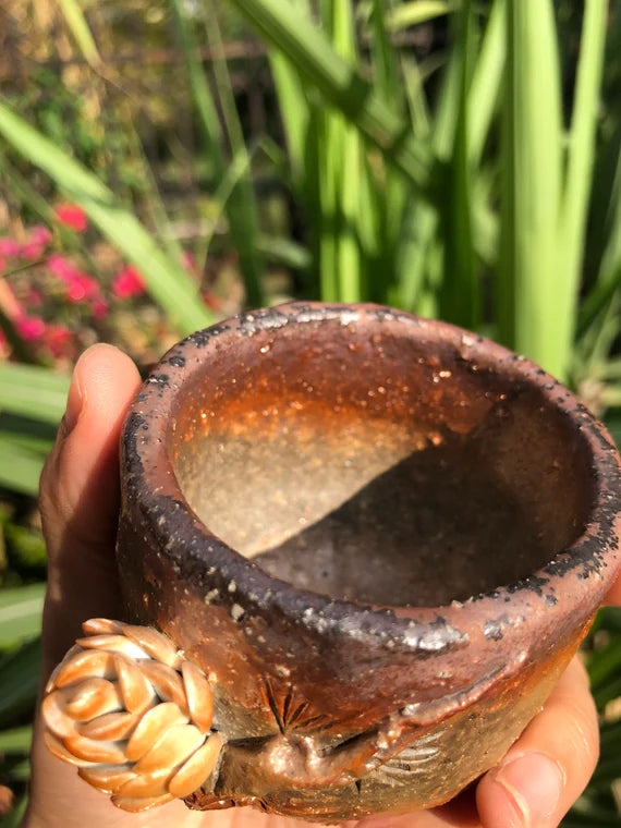 This is a woodfired pottery teacup