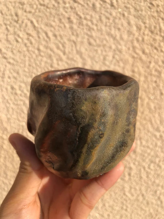 This is a woodfired pottery teacup