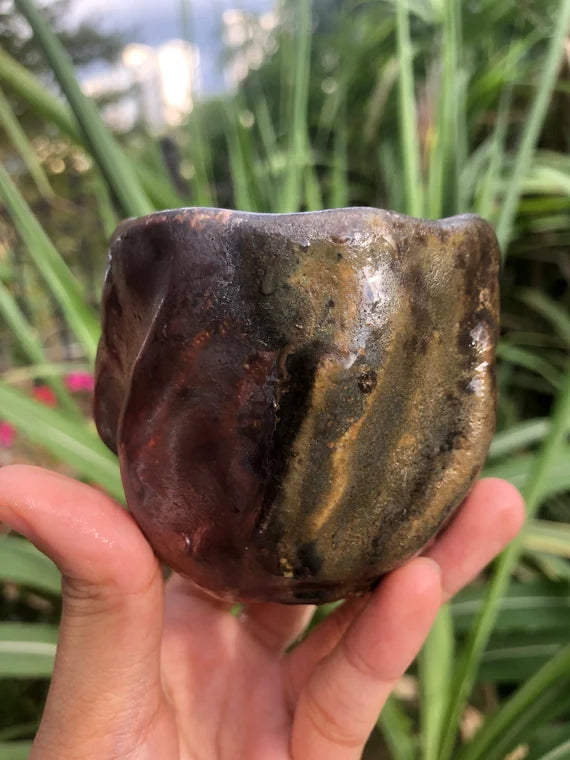 This is a woodfired pottery teacup