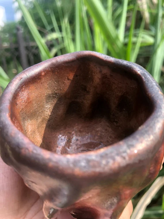 This is a woodfired pottery teacup