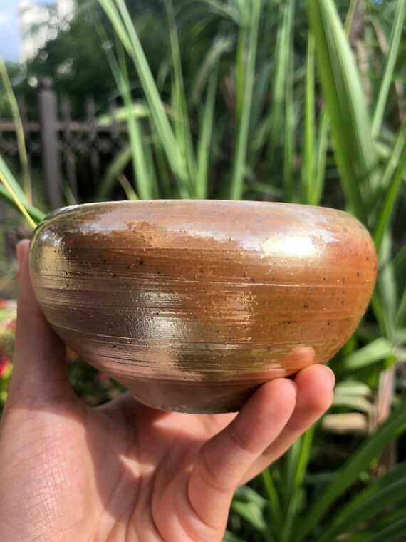 This is a woodfired pottery faircup gongdaobei