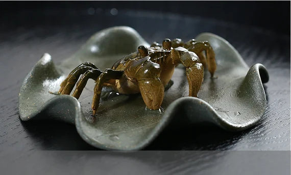 This is a Yixing clay color changing crab teapet