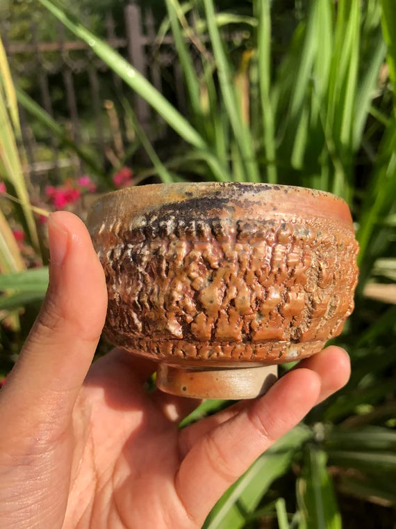 This is a woodfired pottery teacup