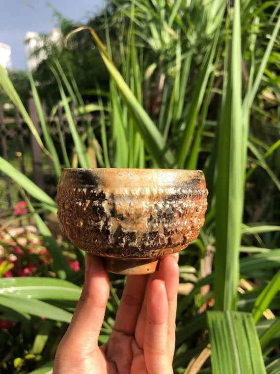 This is a woodfired pottery teacup