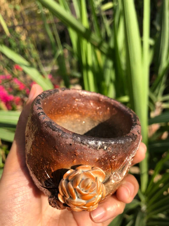 This is a woodfired pottery teacup