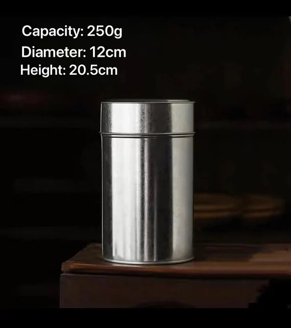 This is a iron tea storage canister tea jar