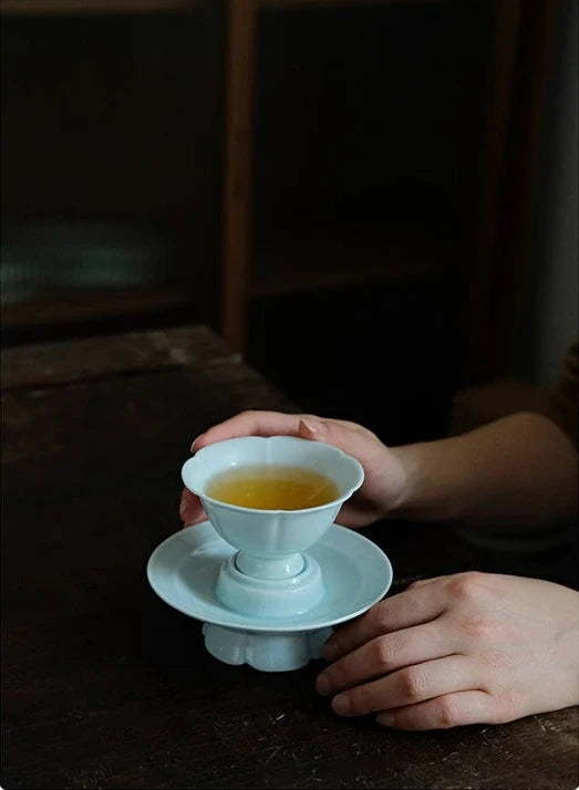 This is a ceramic teacup.this is wood ash glaze teacup