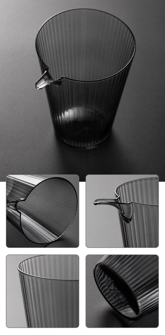 This is a transparent black glass faircup gongdaobei