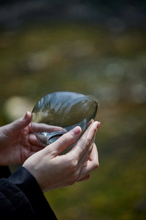 This is a transparent black glass faircup gongdaobei