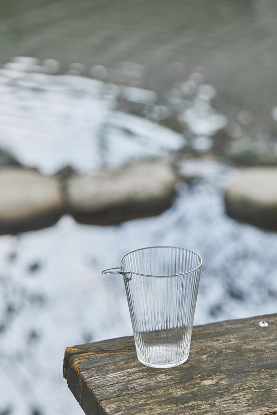 This is a transparent black glass faircup gongdaobei