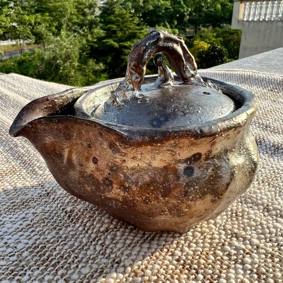 This is a pottery teapot 