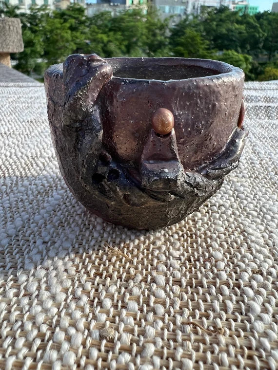 This is a woodfired pottery teacup