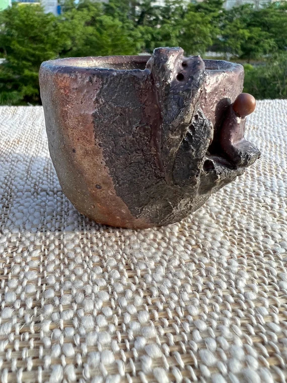 This is a woodfired pottery teacup