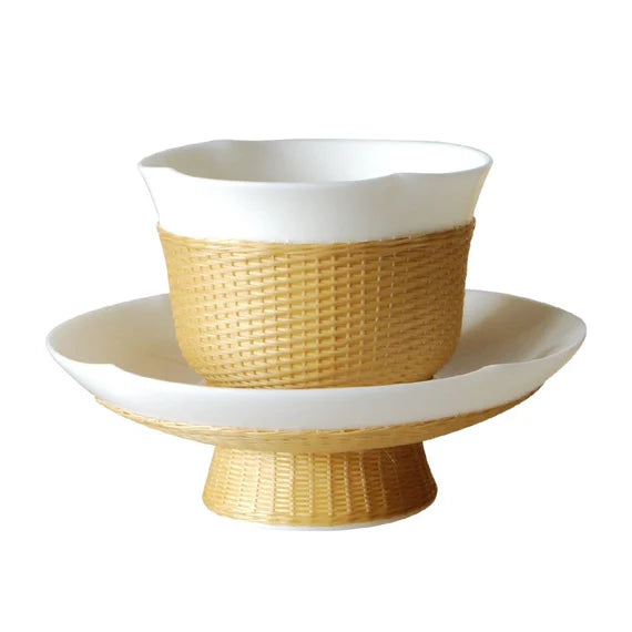 This is a bamboo woven teacup.this is a ceramic teacup