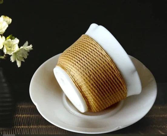 This is a bamboo woven teacup.this is a ceramic teacup