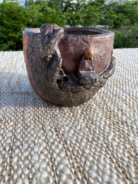 This is a woodfired pottery teacup