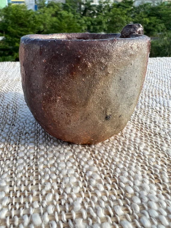 This is a woodfired pottery teacup