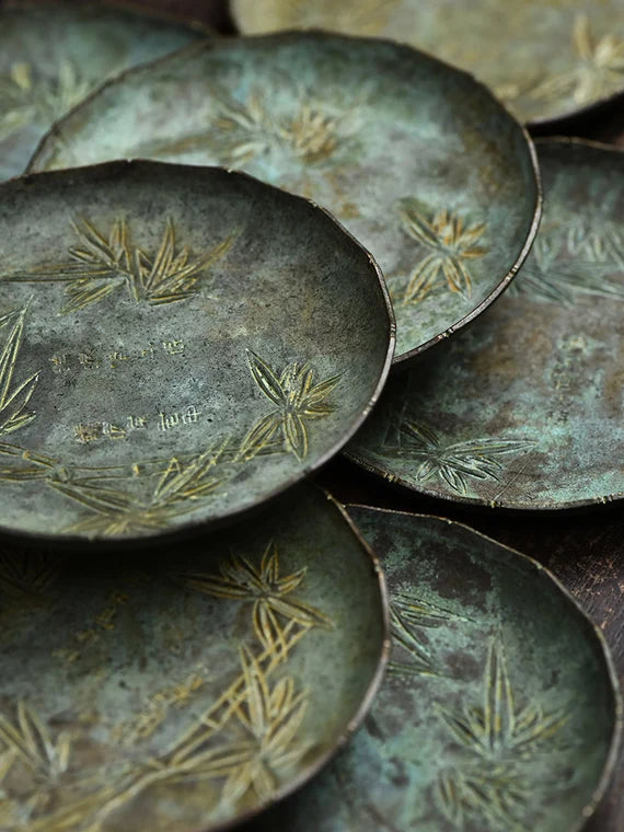 this is a copper teacup tray