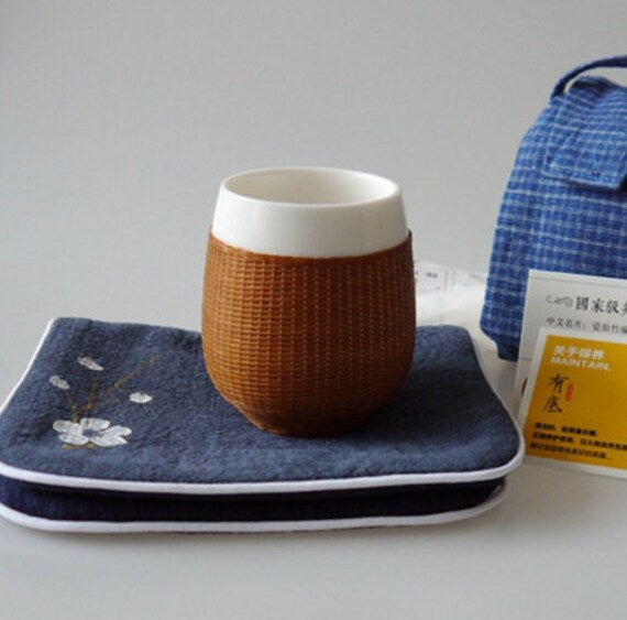 This is a bamboo woven teacup.this is a ceramic teacup