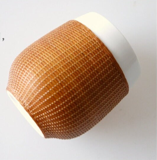 This is a bamboo woven teacup.this is a ceramic teacup