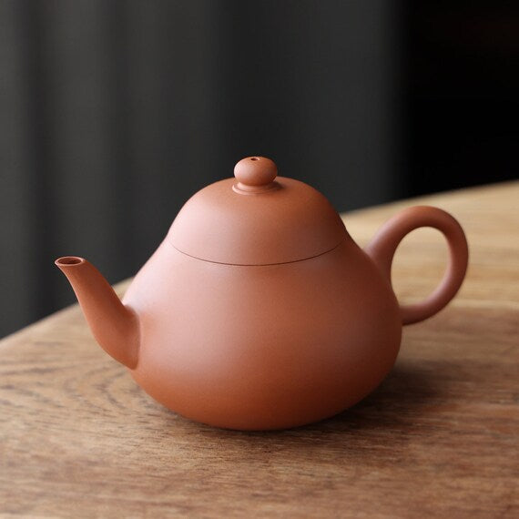 This is a Chaozhou teapot.this is Chaozhou red clay zhuni teapot