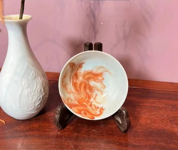 this is a Chinese Jingdezhen alum red phoenix teacup.this is a ceramic teacup