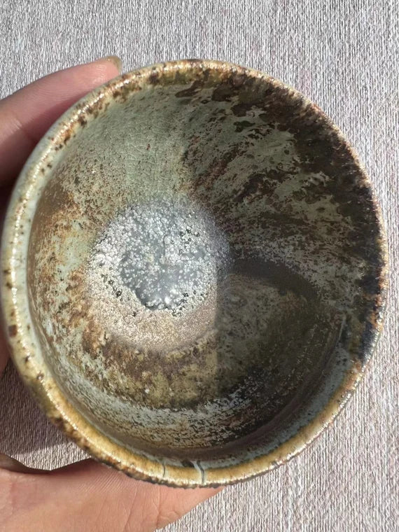 This is a woodfired pottery teacup