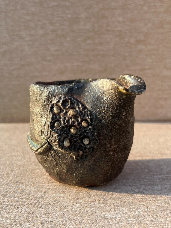 This is a woodfired pottery faircup gongdaobei