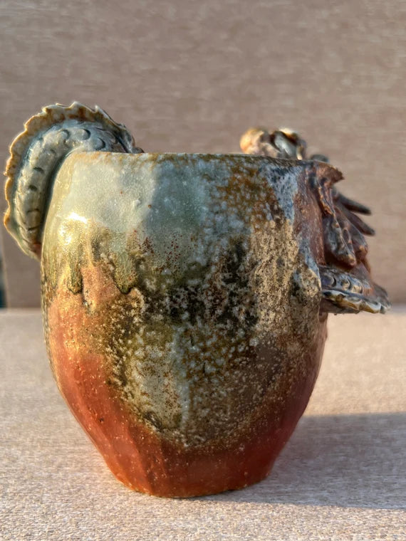 This is a woodfired pottery dragon faircup gongdaobei