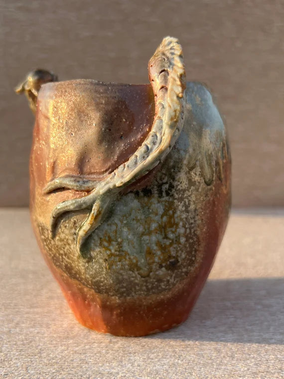 This is a woodfired pottery dragon faircup gongdaobei