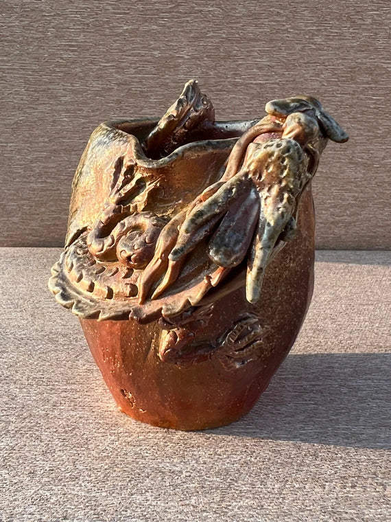 This is a woodfired pottery dragon faircup gongdaobei