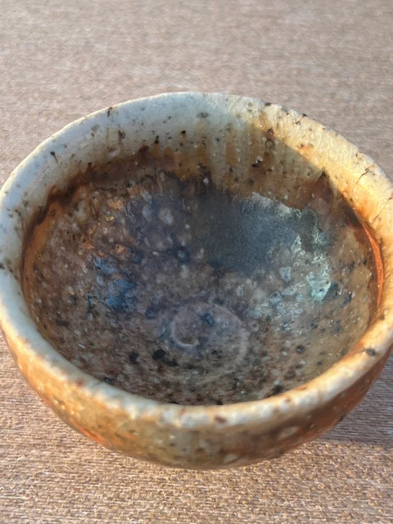 This is a woodfired pottery teacup