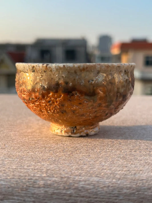 This is a woodfired pottery teacup