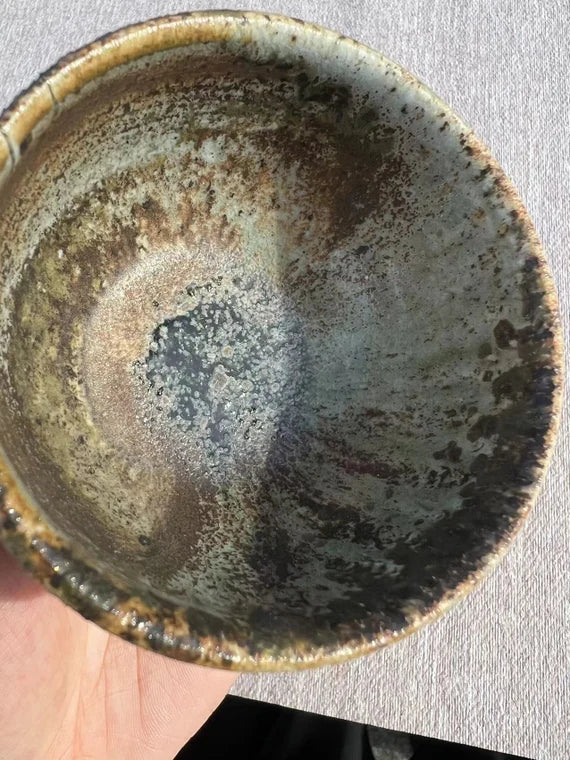 This is a woodfired pottery teacup