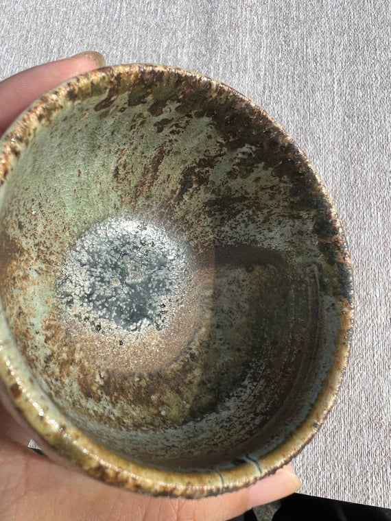 This is a woodfired pottery teacup