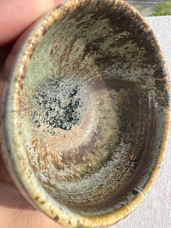 This is a woodfired pottery teacup