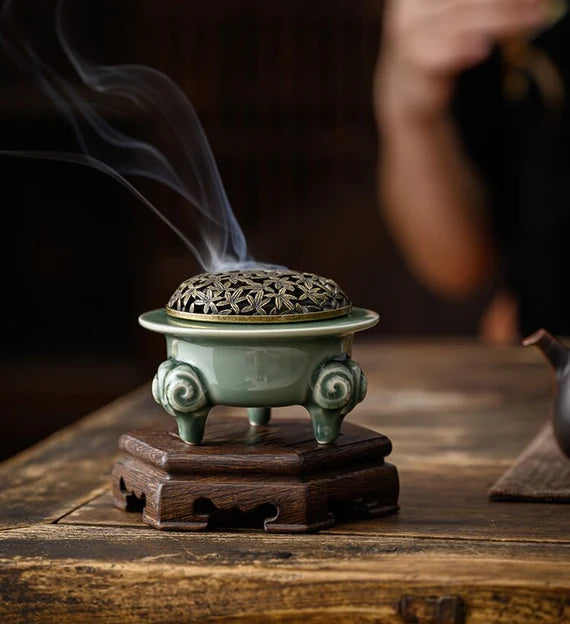 This is a Yue kiln celadon incense burner