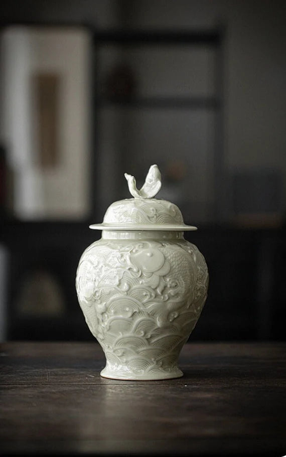 this is a celadon tea jar.this is a green ceramic tea storage canister