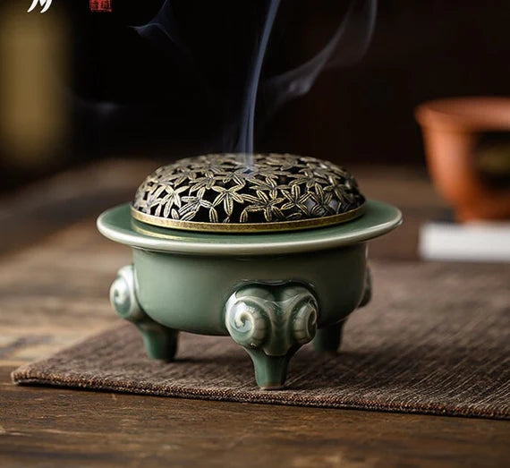 This is a Yue kiln celadon incense burner