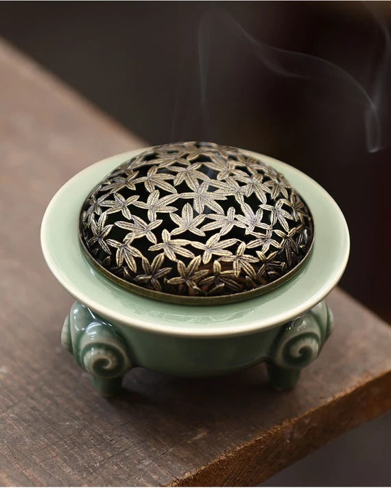 This is a Yue kiln celadon incense burner