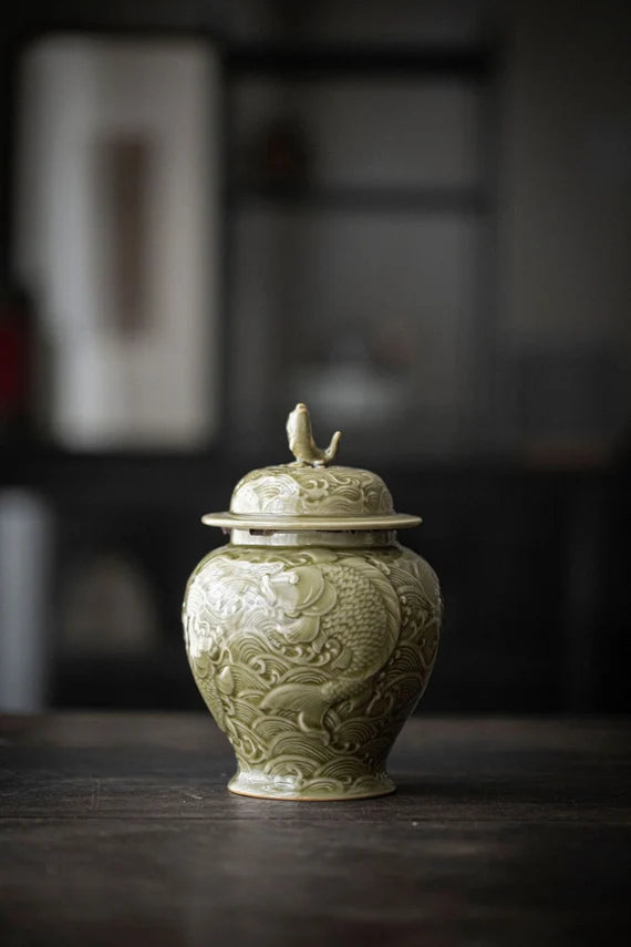 this is a celadon tea jar.this is a green ceramic tea storage canister