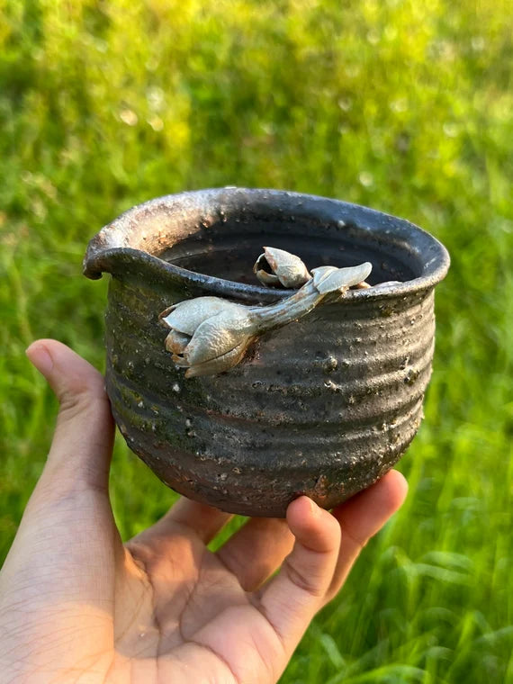 This is a woodfired flower fair cup gongdaobei