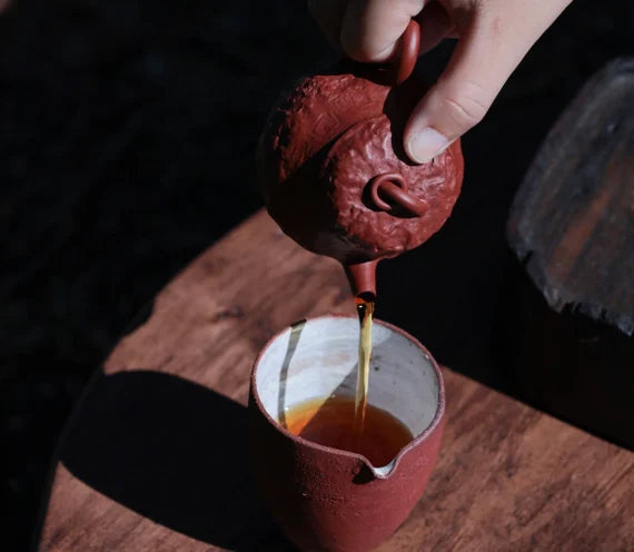 This is a purple clay teapot