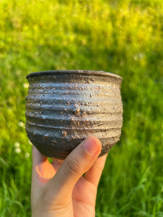 This is a woodfired flower fair cup gongdaobei