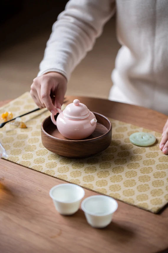 This is a ceramic teapot