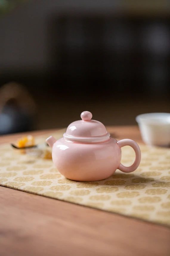 This is a ceramic teapot