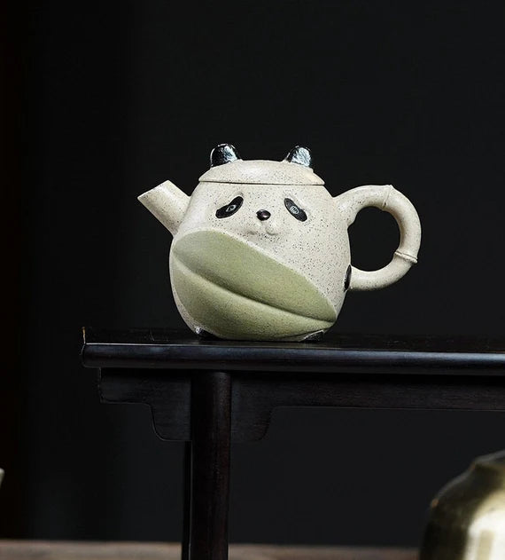 This is a pottery teapot