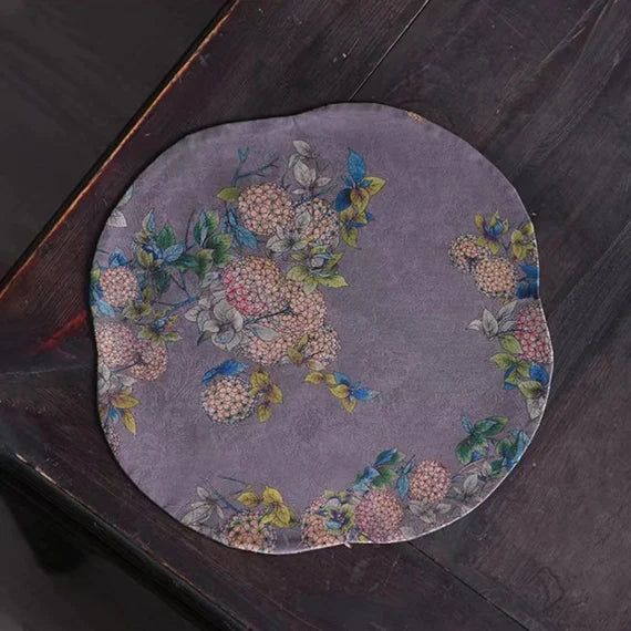 This is a silk brocade tea mat.this is a waterproof table cloth