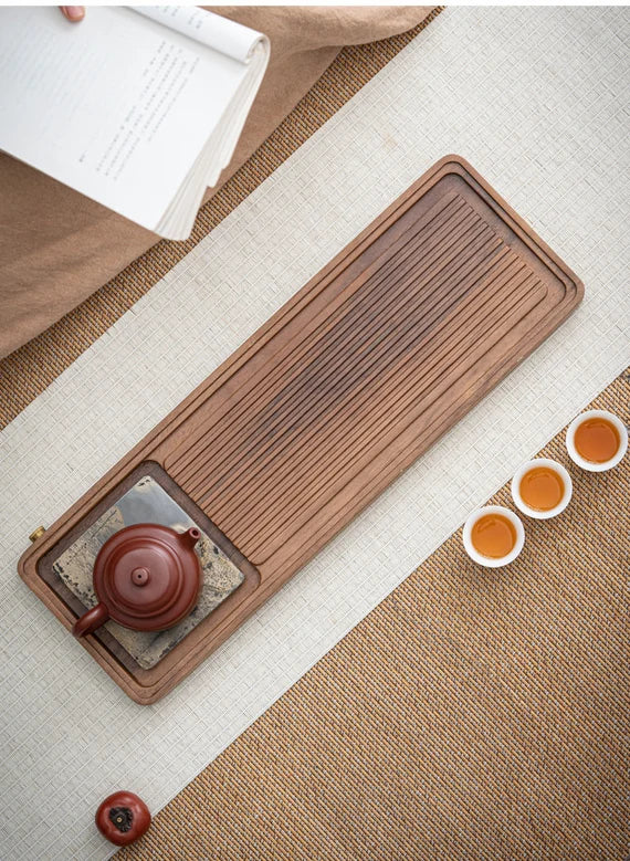 this is a walnut tea tray tea boat