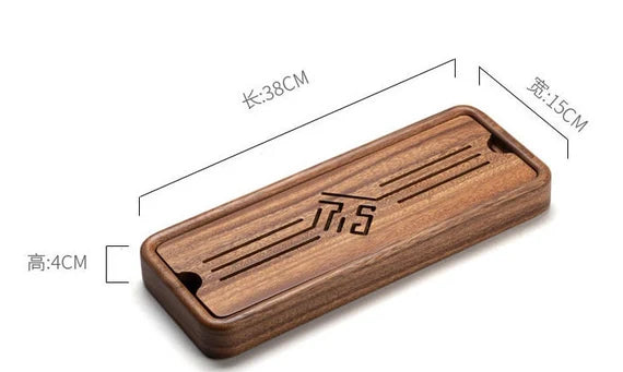 this is a walnut tea tray tea boat